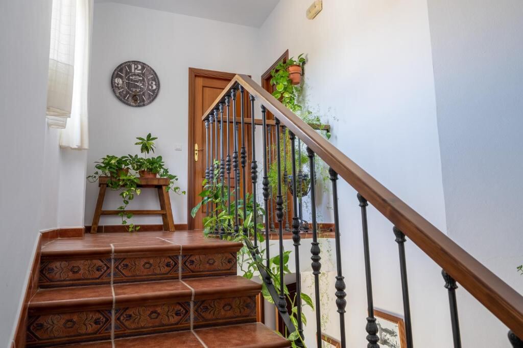 Tiled staircase inside Hostal Vista a la Sierra